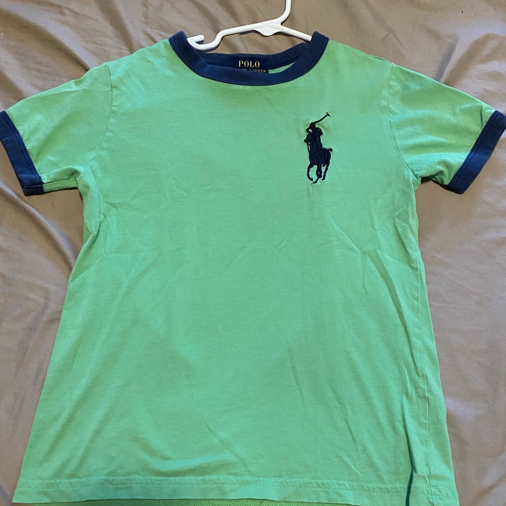 Green big logo polo tee.
